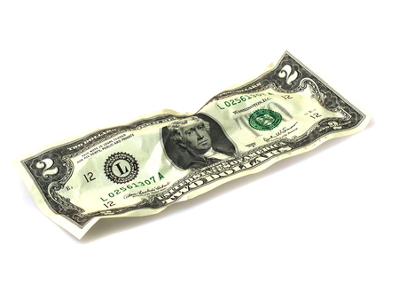 Close up of two dollar bill isolate on white background.の写真素材
