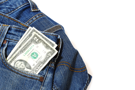 Money in the jeans pocket isolated on background