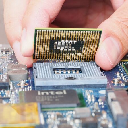 Computer engineer is installing into mainboard