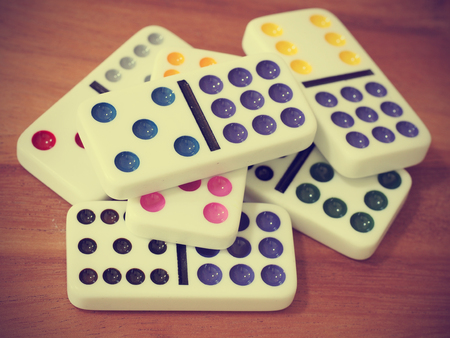 dominoes on wooden backgroundの写真素材