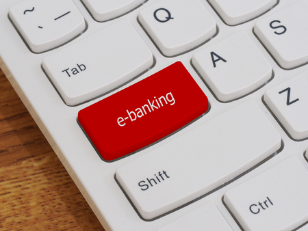 Computer keyboard button with e-banking text