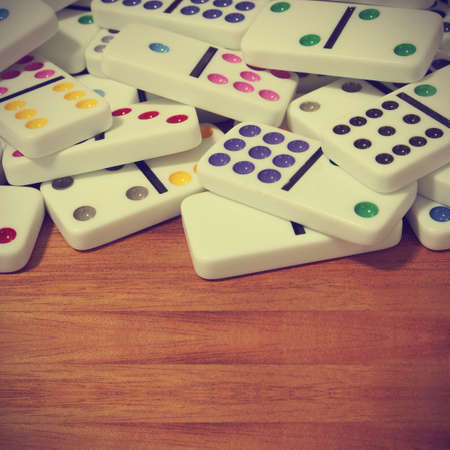 dominoes on wooden backgroundの写真素材