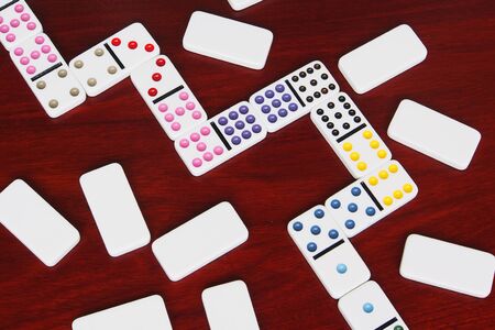 dominoes game on wooden backgroundの写真素材