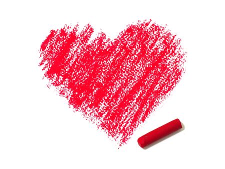 Oil pastels color drawing a red heart shape.の写真素材