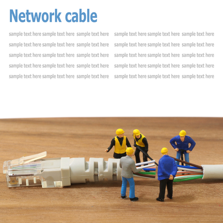 Group of engineer workers are repair LAN network connection RJ45 cable