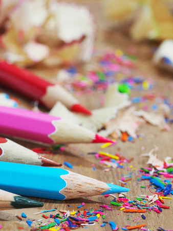 Sharpened color pencil and pencil shavingsの写真素材
