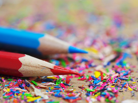 Sharpened color pencil and pencil shavingsの写真素材