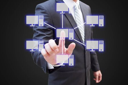 Businessman hand touching virtual panel of star topology , Computer network technology conceptの写真素材
