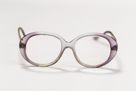 Front view of reading glasses with tortoiseshell frames on white backgroundの写真素材