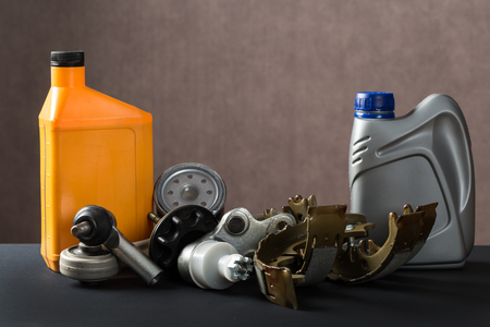 New car parts on a gray background closeup. Shop for autoの写真素材