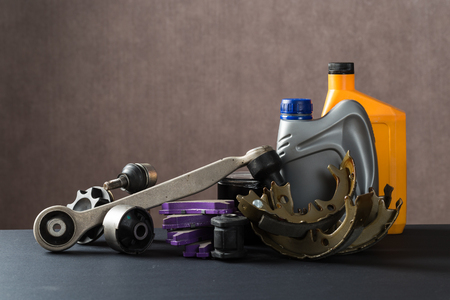 New car parts on a gray background closeup. Shop for autoの写真素材