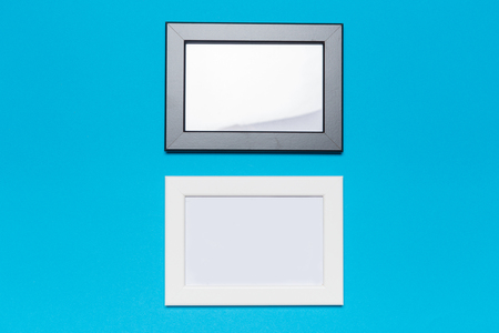 Picture frame and photo gallery on the blue background.top viewの写真素材