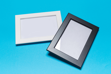 Picture frame and photo gallery on the blue background.top viewの写真素材