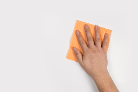 Man's or woman's hand cleaning on a white backgroundの写真素材