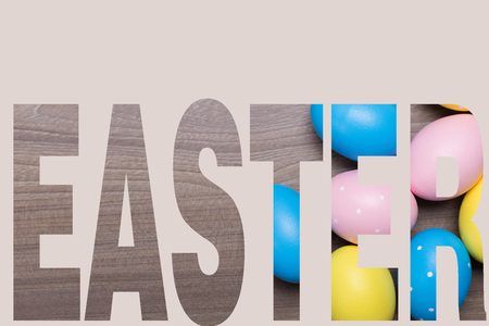 Easter eggs on wooden table. Holiday backgroundの写真素材