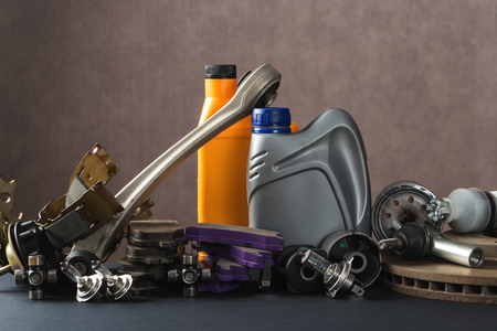 New car parts on a gray background closeup. Shop for autoの写真素材