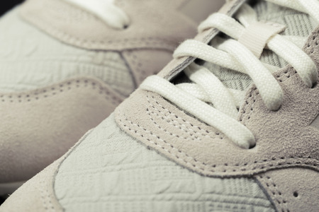Sport shoes with white laces. Sneakers are shoes designed primarily for sportsの写真素材