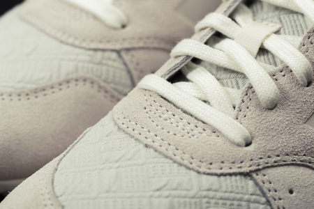 Sport shoes with white laces. Sneakers are shoes designed primarily for sportsの写真素材