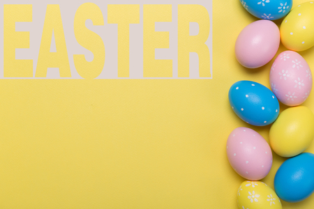 easter eggs on yellow pastel color background with space. Conceptの写真素材