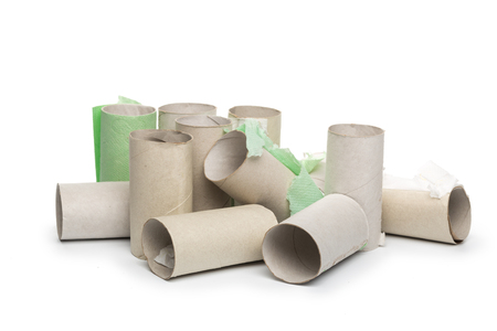 Empty toilet paper on white backgroundの写真素材