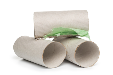 Empty toilet paper on white backgroundの写真素材