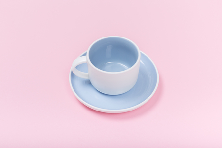 Clean coffee or tea cup on pink background. top view and flat layの写真素材