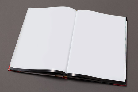 Mock-up magazine or catalog on gray background.Blank page or notepad for mockups or simulations.の写真素材