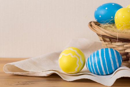 Easter eggs in the basket. Easter holiday concept.の写真素材