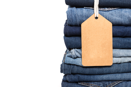Beauty and fashion, clothing concept - stack of jeansの写真素材