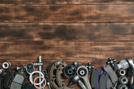 Various car parts  
 on wooden backgroundの写真素材