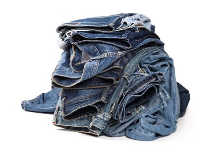 Blue jeans isolated on white background, jeans stackedの写真素材