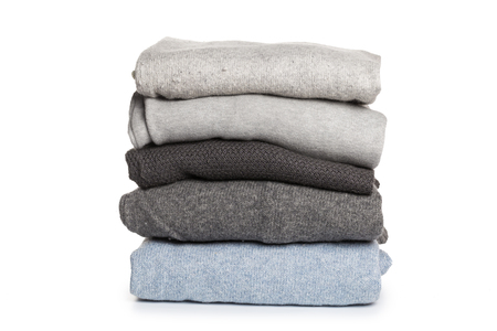 Folded sweater pattern on white background isolationの写真素材