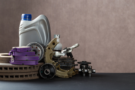 New car parts on a gray background closeup. Shop for autoの写真素材