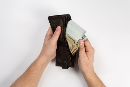 Man holding a wallet isolated on white background