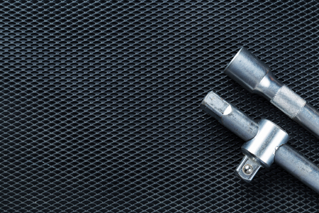 Various Car parts on black background