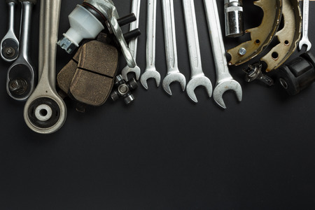 Various Car parts on dark background