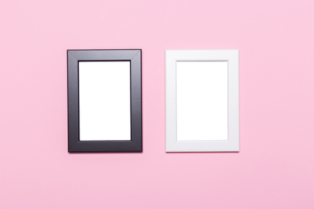skandinavian blank frame on a pastel pink backgroundの写真素材
