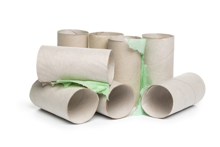 Empty toilet paper on white backgroundの写真素材