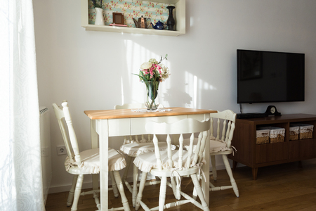 Nicely decorated living ( lunch ) room. Dining table and some chairs.の写真素材