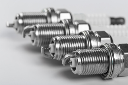 Spark plugs gasoline internal combustion engine on white backgroundの写真素材