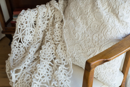 white knitted cover on the chair. retroの写真素材