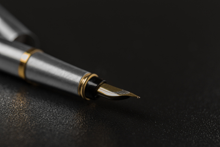 Fountain pen with clipping path on black backgroundの写真素材