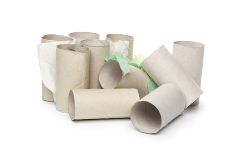 Empty toilet paper on white backgroundの写真素材