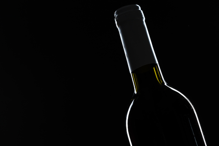 Template concept  wine bottle for your design and advertising company promotion your of product on black background with copy space. Wine bottle mockup.の写真素材
