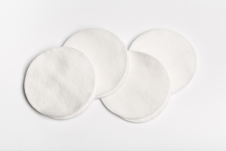 Cotton swabs isolated on a white background. Cotton disksの写真素材