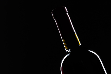 Template concept  wine bottle for your design and advertising company promotion your of product on black background with copy space. Wine bottle mockup.の写真素材