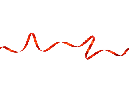 Red satin ribbon isolated on white backgroungの写真素材