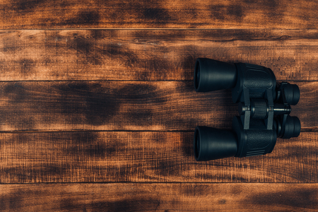Overhead view of travel equipment for a backpacking trip on wooden floor.  Time to travel concept.の写真素材