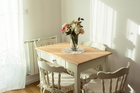 Nicely decorated living ( lunch ) room. Dining table and some chairs.の写真素材