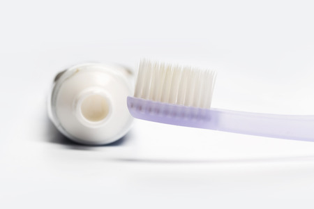 Flat lay composition with manual toothbrushes on white background.の写真素材